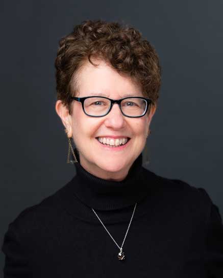 smiling woman with glasses