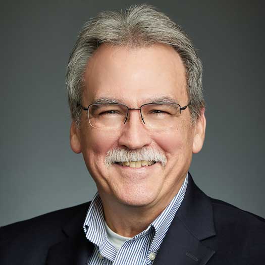 smiling man with glasses