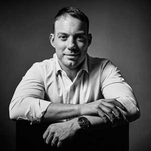photo of man with arms crossed