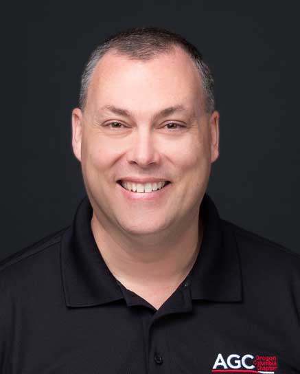 smiling man in black shirt