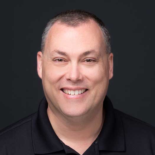 smiling man in black shirt