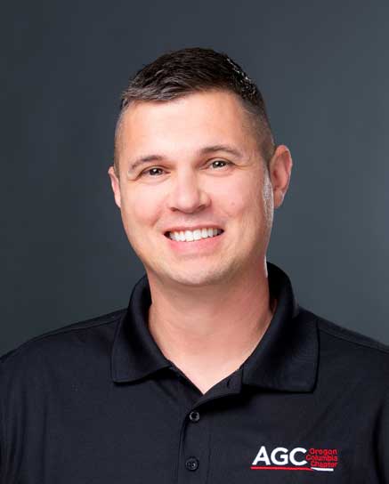 smiling man wearing black shirt