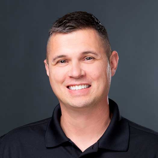 smiling man wearing black shirt