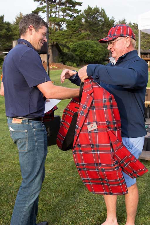 men holding plaid jacket