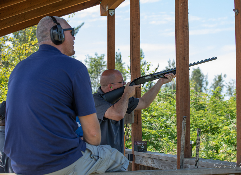 two men at shooting event