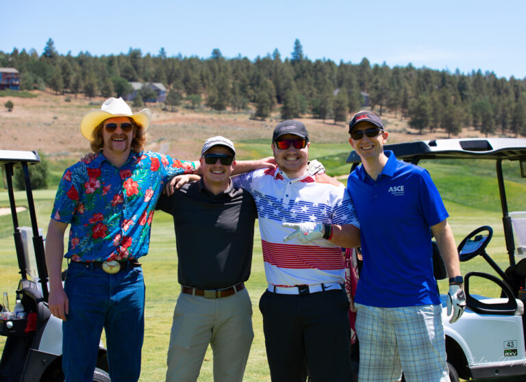 smiling group of golfers