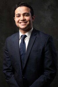 smiling man in suit