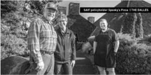 man wearing a hat, woman wearing glasses, man wearing an apron