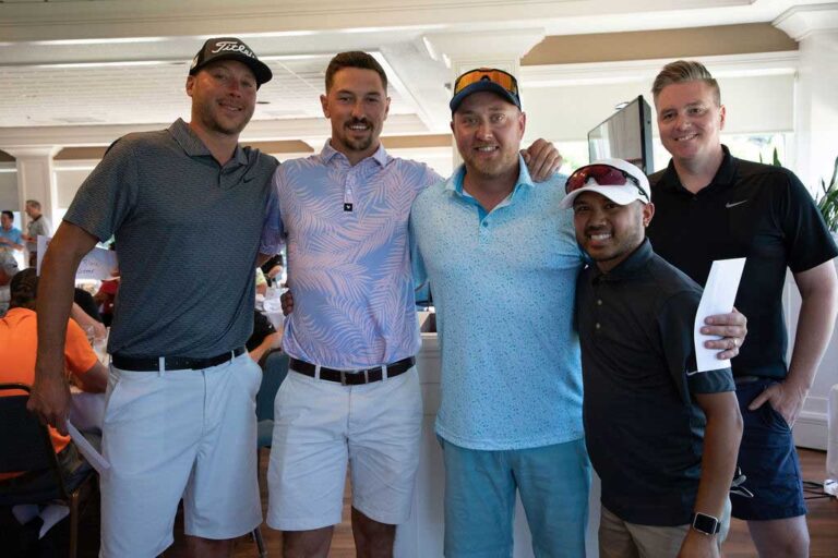 five male golfers