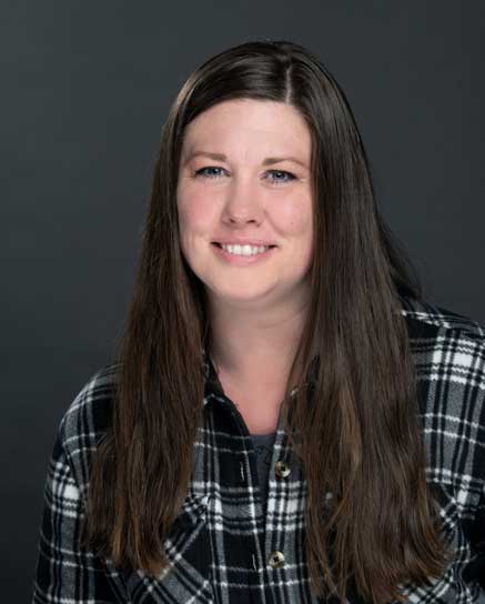 smiling woman with long dark hair