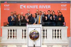 group standing at the at NYSE