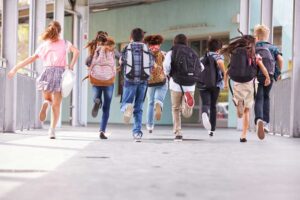 students wearing backpacks