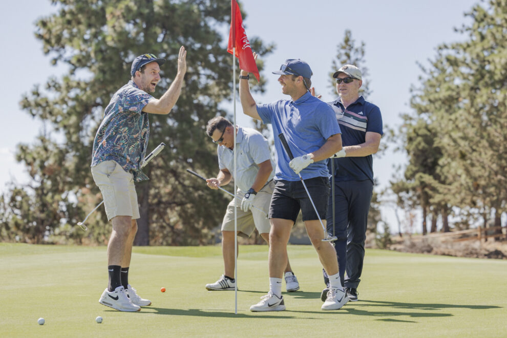 golfers high-fiving