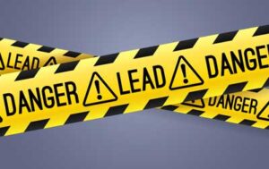 caution tape saying "Danger - lead"