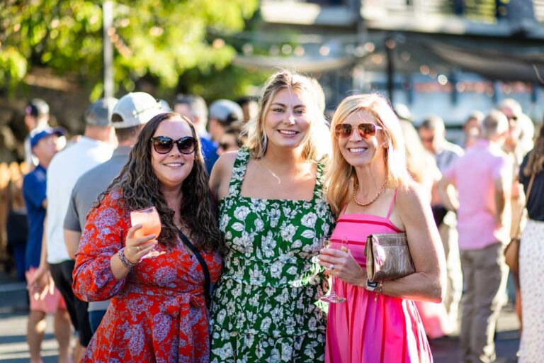 three smiling ladies