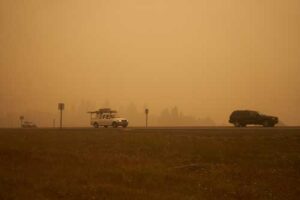 smoky air and cars on a highway